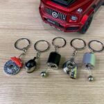 4 Keychain Combo | Gear Shifter | Disc Brake |  Turbo | Spinning Alloy Rims | Piston | Metal Shocker