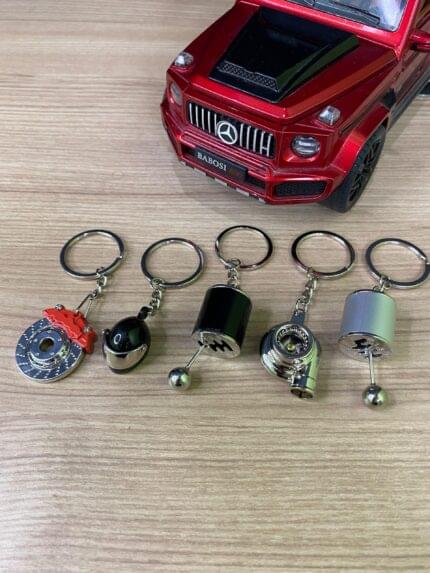 4 Keychain Combo | Gear Shifter | Disc Brake |  Turbo | Spinning Alloy Rims | Piston | Metal Shocker
