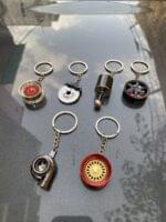 4 Keychain Combo | Gear Shifter | Disc Brake |  Turbo | Spinning Alloy Rims | Piston | Metal Shocker - Image 8